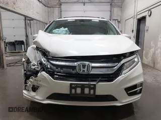 2019 Honda Odyssey Touring with VIN 5FNRL6H8XKB079113, listed as a IAAI auction lot 42359455 with 74,545 mi miles and . Bid and sale history available at DreamBid. Image 13.