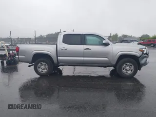 2023 Toyota Tacoma SR with VIN 3TYAX5GN0PT071080, listed as a IAAI auction lot 42426897 with 58,017 mi miles and . Bid and sale history available at DreamBid. Image 13.