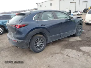 2022 Mazda CX-30 S with VIN 3MVDMBAL8NM411739, listed as a IAAI auction lot 41668265 with 34,964 mi miles and . Bid and sale history available at carsss.com. Image 4.