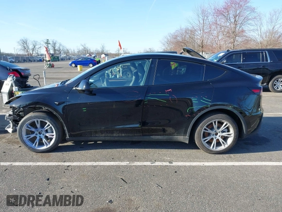 2023 Tesla Model Y Long Range with VIN 7SAYGAEE3PF925928, listed as a IAAI auction lot 41753910 with Not provided miles and . Bid and sale history available at DreamBid. Image 14.