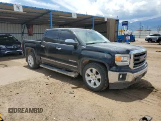 2014 GMC Sierra 1500 SLT with VIN 3GTU2VEC6EG373784, listed as a Copart auction lot 63450945 with 195,401 mi miles and Salvage title. Bid and sale history available at DreamBid. Image 4.