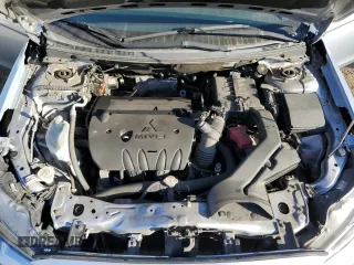 2015 Mitsubishi Lancer ES with VIN JA32U2FU4FU021260, listed as a Copart auction lot 77233514 with 99,548 mi miles and Salvage Title. Bid and sale history available at carsss.com. Image 12.