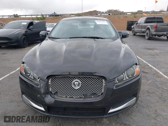 2013 Jaguar XF I4 RWD with VIN SAJWA0ES0DPS64027, listed as a IAAI auction lot 41569121 with 103,115 mi miles. Bid and sale history available at carsss.com. Image 12.