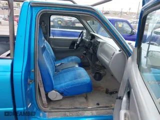 1995 Ford Ranger XLT with VIN 1FTCR10X7STA57755, listed as a IAAI auction lot 42023603 with 302,746 mi miles. Bid and sale history available at carsss.com. Image 5.
