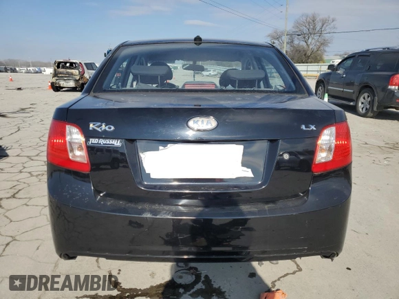 2010 Kia Rio LX with VIN KNADH4A3XA6652808, listed as a Copart auction lot 42597245 with 164,768 mi miles and Salvage Title. Bid and sale history available at carsss.com. Image 6.