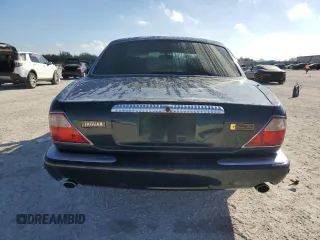 2001 Jaguar XJ Vanden Plas with VIN SAJDA24C51LF38566, listed as a Copart auction lot 43314625 with 100,298 mi miles and Salvage title. Bid and sale history available at DreamBid. Image 6.