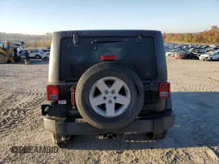 2018 Jeep Wrangler JK Unlimited Sport S with VIN 1C4BJWDG2JL874348, listed as a Copart auction lot 77430104 with 115,813 mi miles and Salvage Title. Bid and sale history available at carsss.com. Image 6.
