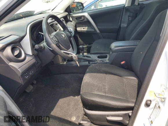 2018 Toyota RAV4 LE with VIN 2T3BFREV2JW780824, listed as a Copart auction lot 60258635 with 59,030 mi miles and Salvage title. Bid and sale history available at DreamBid. Image 7.