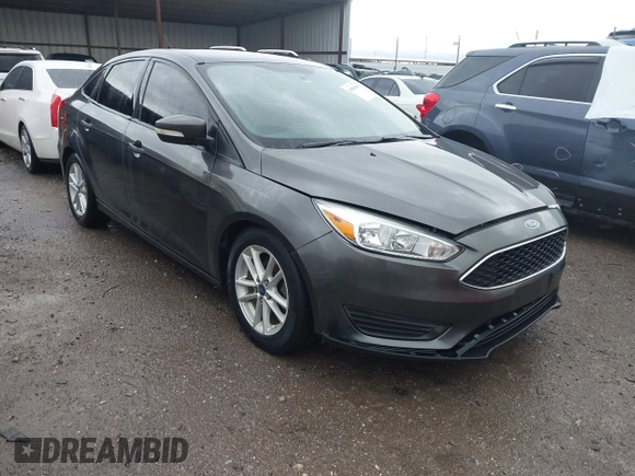 2015 Ford Focus SE with VIN 1FADP3F28FL219552, listed as a IAAI auction lot 41959648 with 128,590 mi miles. Bid and sale history available at carsss.com. Image 1.