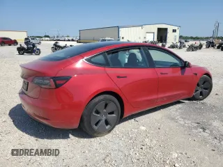 2023 Tesla Model 3 with VIN 5YJ3E1EA3PF698265, listed as a Copart auction lot 53067455 with 12,192 mi miles and Salvage title. Bid and sale history available at DreamBid. Image 3.