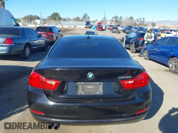 2014 BMW 4 Series 428i with VIN WBA3N7C55EK221259, listed as a IAAI auction lot 41322781 with 100,274 mi miles and . Bid and sale history available at carsss.com. Image 16.