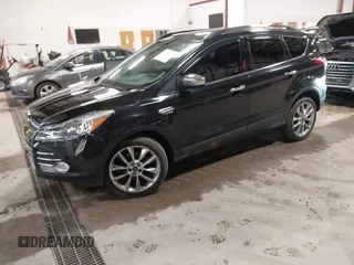 2015 Ford Escape SE with VIN 1FMCU9G9XFUA70029, listed as a IAAI auction lot 41673827 with 82,043 mi miles. Bid and sale history available at carsss.com. Image 18.