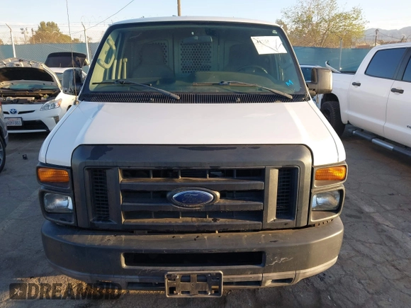 2011 Ford Econoline Cargo Commercial with VIN 1FTNE2EL2BDA71427, listed as a IAAI auction lot 41755582 with 157,531 mi miles. Bid and sale history available at carsss.com. Image 12.