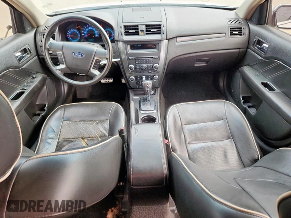 2012 Ford Fusion SEL with VIN 3FAHP0JG0CR395673, listed as a Copart auction lot 57904135 with 169,886 mi miles and Salvage title. Bid and sale history available at DreamBid. Image 8.