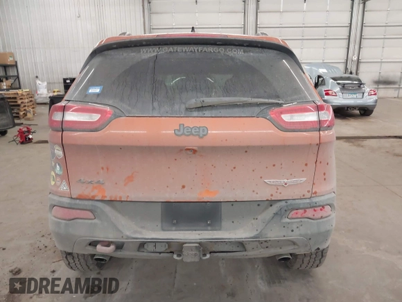 2015 Jeep Cherokee Trailhawk with VIN 1C4PJMBS5FW524462, listed as a IAAI auction lot 41774347 with 107,592 mi miles. Bid and sale history available at carsss.com. Image 17.