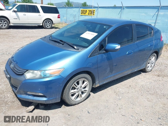 2010 Honda Insight EX with VIN JHMZE2H73AS014811, listed as a IAAI auction lot 42517559 with 173,579 mi miles and . Bid and sale history available at DreamBid. Image 2.