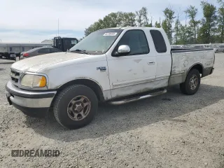 1998 Ford F-150 with VIN 2FTZX1766WCA27840, listed as a Copart auction lot 56186495 with 147,127 mi miles and Clean title. Bid and sale history available at DreamBid. Image 1.
