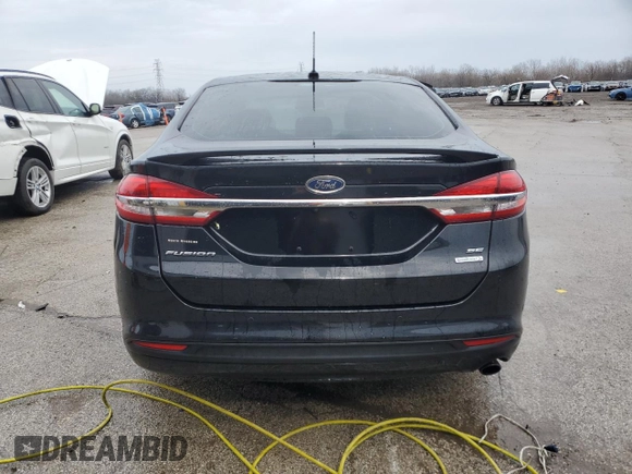 2018 Ford Fusion SE with VIN 3FA6P0HD4JR259241, listed as a Copart auction lot 51536565 with 84,877 mi miles and Salvage Title. Bid and sale history available at DreamBid. Image 6.