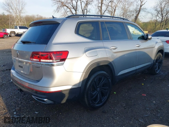 2023 Volkswagen Atlas SE with VIN 1V2HR2CA6PC523233, listed as a IAAI auction lot 41952399 with 28,387 mi miles and . Bid and sale history available at DreamBid. Image 4.