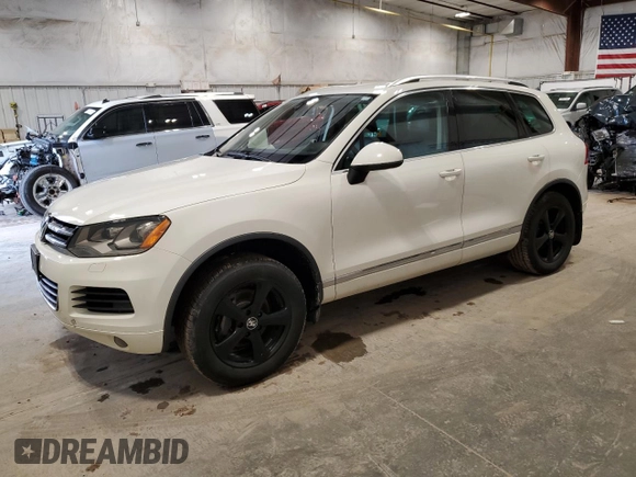 2012 Volkswagen Touareg Sport with VIN WVGFK9BP3CD002756, listed as a Copart auction lot 53378665 with 149,918 mi miles and Clean title. Bid and sale history available at DreamBid. Image 1.