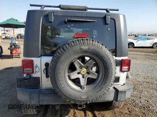 2009 Jeep Wrangler Rubicon with VIN 1J4GA64149L757121, listed as a Copart auction lot 74258934 with 73,241 mi miles and Salvage Title. Bid and sale history available at DreamBid. Image 6.