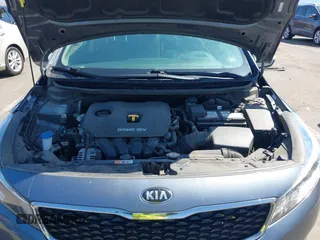 2018 Kia Forte LX with VIN 3KPFL4A77JE220538, listed as a IAAI auction lot 42095964 with 98,977 mi miles and . Bid and sale history available at DreamBid. Image 10.