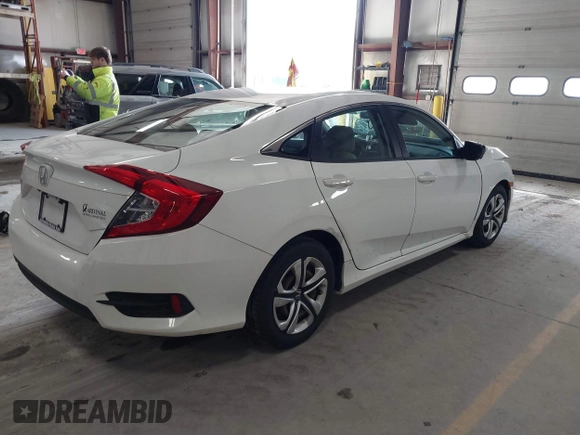 2016 Honda Civic Sedan LX with VIN 19XFC2F59GE028056, listed as a IAAI auction lot 41875940 with 124,243 mi miles. Bid and sale history available at carsss.com. Image 4.
