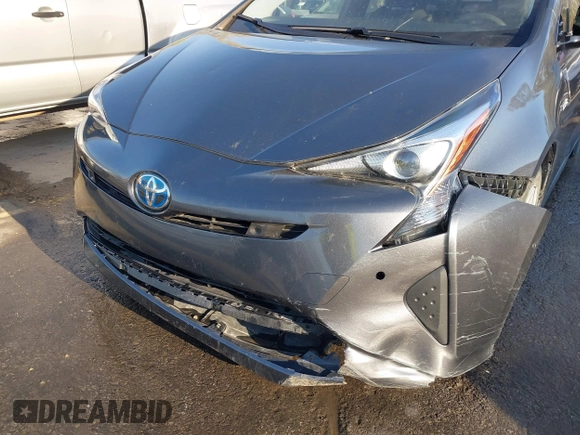 2017 Toyota Prius Two z VIN JTDKBRFU0H3040476, wystawiony jako IAAI lot #41863797 z przebiegiem 51 045 mil mil oraz . Historia ofert i sprzedaży dostępna na DreamBid. Obrazek 6.