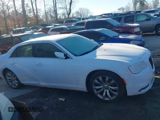 2016 Chrysler 300 Anniversary Edition with VIN 2C3CCAAG6GH343881, listed as a IAAI auction lot 41593752 with 135,719 mi miles and . Bid and sale history available at DreamBid. Image 13.