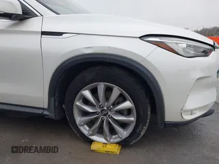 2020 Infiniti QX50 Luxe z VIN 3PCAJ5M15LF105513, wystawiony jako IAAI lot #41492732 z przebiegiem 71 576 mil mil oraz . Historia ofert i sprzedaży dostępna na DreamBid. Obrazek 19.