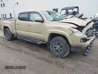 2020 Toyota Tacoma SR5 with VIN 3TMDZ5BN9LM085063, listed as a IAAI auction lot 42320761 with 100,830 mi miles and . Bid and sale history available at DreamBid. Image 1.