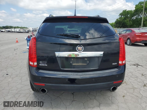 2014 Cadillac SRX Luxury Collection z VIN 3GYFNBE38ES527370, wystawiony jako Copart lot #55518735 z przebiegiem 141 379 mil mil oraz Szkoda całkowita • Salvage title. Historia ofert i sprzedaży dostępna na DreamBid. Obrazek 6.