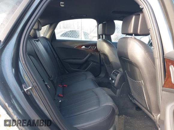 2014 Audi A6 Prestige with VIN WAUHGBFC8EN104920, listed as a IAAI auction lot 41827864 with 70,289 mi miles and . Bid and sale history available at DreamBid. Image 8.