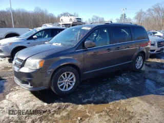 2018 Dodge Grand Caravan SXT with VIN 2C4RDGCGXJR325632, listed as a Copart auction lot 46326655 with 128,692 mi miles and Clean Title. Bid and sale history available at DreamBid. Image 1.