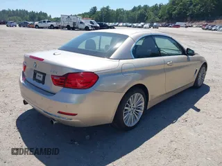 2015 BMW 4 Series 435i xDrive with VIN WBA3T7C51FP942320, listed as a IAAI auction lot 42584318 with 81,814 mi miles and . Bid and sale history available at DreamBid. Image 4.