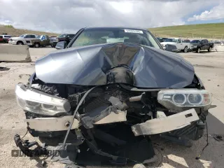 2015 BMW 4 Series 428i z VIN WBA4A5C53FG051038, wystawiony jako Copart lot #54909705 z przebiegiem 101 536 mil mil oraz Nie do naprawy • Non repairable. Historia ofert i sprzedaży dostępna na DreamBid. Obrazek 5.