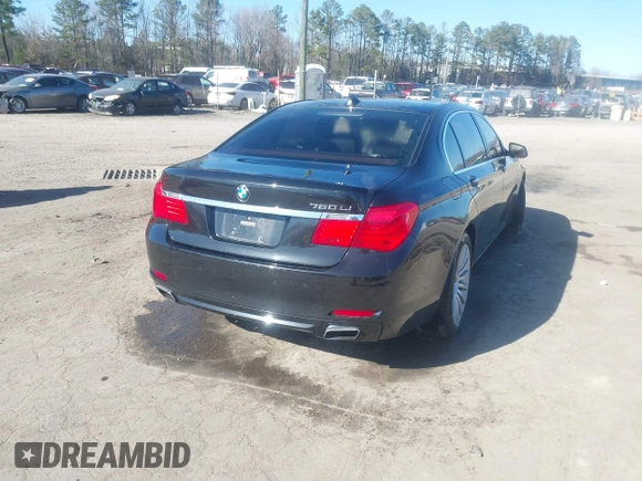 2011 BMW 7 Series 750Li xDrive with VIN WBAKC8C53BC433865, listed as a IAAI auction lot 41823357 with 122,476 mi miles. Bid and sale history available at carsss.com. Image 4.