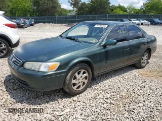 2000 Toyota Camry CE z VIN 4T1BG22K0YU708702, wystawiony jako Copart lot #56755285 z przebiegiem 318 734 mil mil oraz Szkoda całkowita • Salvage title. Historia ofert i sprzedaży dostępna na DreamBid. Obrazek 1.