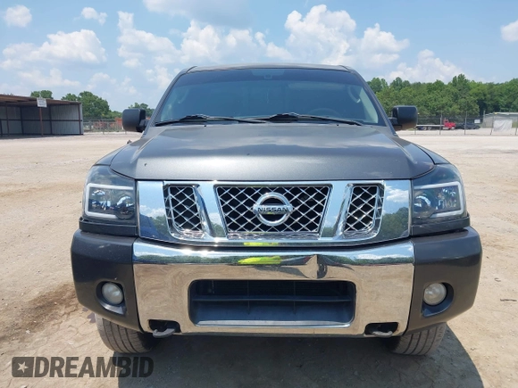 2011 Nissan Titan Pro-4X with VIN 1N6AA0CC3BN313442, listed as a IAAI auction lot 42582789 with 189,582 mi miles and . Bid and sale history available at DreamBid. Image 12.
