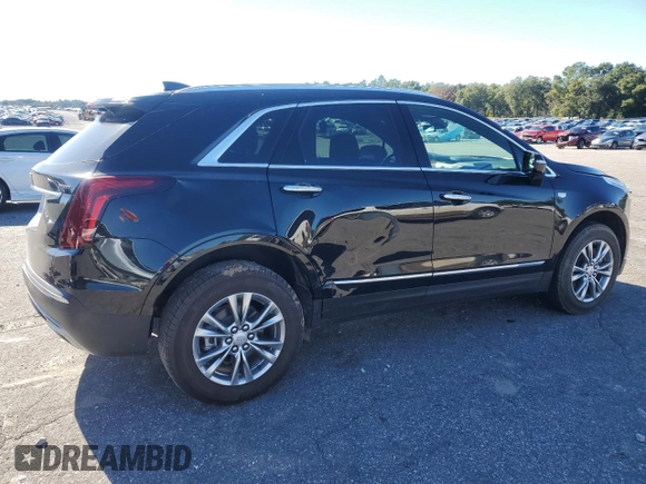 2023 Cadillac XT5 FWD Premium Luxury with VIN 1GYKNCR40PZ189444, listed as a Copart auction lot 84803094 with 22,827 mi miles and Clean Title. Bid and sale history available at carsss.com. Image 3.