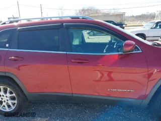 2014 Jeep Cherokee Latitude with VIN 1C4PJMCS7EW285803, listed as a IAAI auction lot 41827874 with 178,767 mi miles. Bid and sale history available at carsss.com. Image 13.