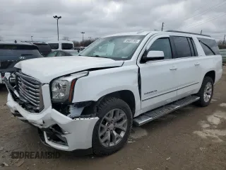 2017 GMC Yukon XL SLE with VIN 1GKS2FKC2HR215016, listed as a Copart auction lot 49651765 with 144,603 mi miles and Salvage Title. Bid and sale history available at carsss.com. Image 1.