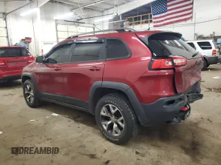 2015 Jeep Cherokee Trailhawk z VIN 1C4PJMBS9FW509642, wystawiony jako Copart lot #52385555 z przebiegiem 135 477 mil mil oraz Szkoda całkowita • Salvage title. Historia ofert i sprzedaży dostępna na DreamBid. Obrazek 2.