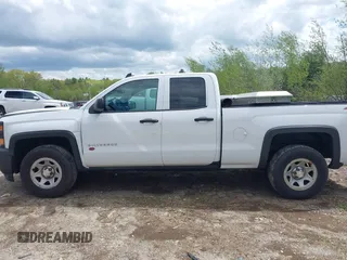 2015 Chevrolet Silverado 1500 Work Truck with VIN 1GCVKPEH9FZ272462, listed as a IAAI auction lot 42208203 with 202,569 mi miles and . Bid and sale history available at DreamBid. Image 14.