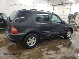 1999 Mercedes-Benz M-Class with VIN 4JGAB54E3XA101177, listed as a Copart auction lot 78703184 with 236,957 mi miles and Salvage Title. Bid and sale history available at carsss.com. Image 3.