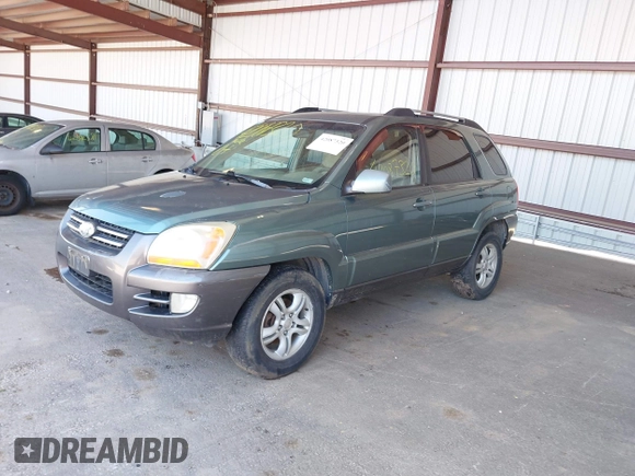 2005 Kia Sportage LX with VIN KNDJF723957065883, listed as a IAAI auction lot 42087320 with 212,726 mi miles and . Bid and sale history available at carsss.com. Image 2.