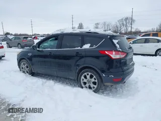 2016 Ford Escape Titanium with VIN 1FMCU9J96GUC08563, listed as a IAAI auction lot 41252475 with 120,404 mi miles. Bid and sale history available at carsss.com. Image 14.