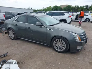 2011 Cadillac CTS Premium with VIN 1G6DS5EDXB0148988, listed as a IAAI auction lot 42269801 with 127,001 mi miles and . Bid and sale history available at DreamBid. Image 1.
