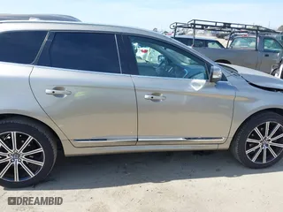 2016 Volvo XC60 T5 Drive-E Premier with VIN YV440MDK1G2854334, listed as a IAAI auction lot 41580888 with 49,765 mi miles. Bid and sale history available at carsss.com. Image 13.