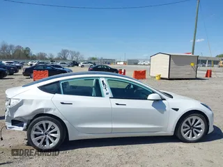 2023 Tesla Model 3 with VIN 5YJ3E1EA7PF592966, listed as a IAAI auction lot 41879794 with 13,423 mi miles and . Bid and sale history available at carsss.com. Image 14.